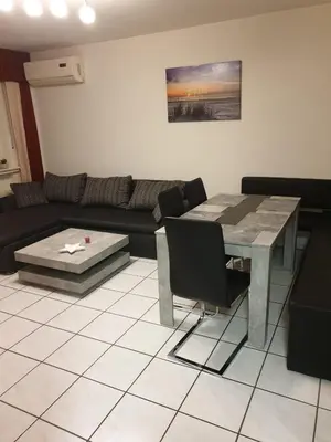 Ein Sitzbereich in der Unterkunft Ferienwohnung Calabria Nr 2