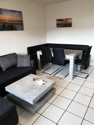 Ein Sitzbereich in der Unterkunft Ferienwohnung Calabria Nr 2