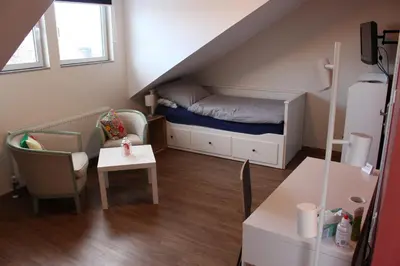 Ein Bett oder Betten in einem Zimmer der Unterkunft Bed Taste