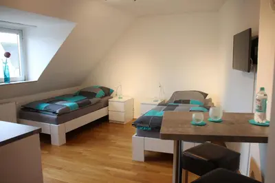Ein Bett oder Betten in einem Zimmer der Unterkunft Fewo Lorri