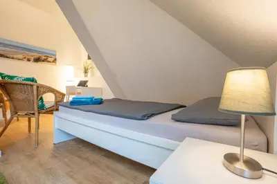 Ein Bett oder Betten in einem Zimmer der Unterkunft Wohnen wie zu Hause