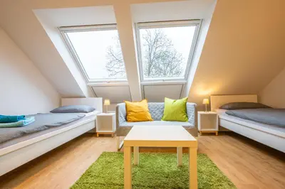 Ein Sitzbereich in der Unterkunft Wohnen wie zu Hause