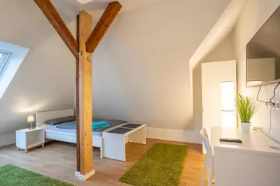Ein Bett oder Betten in einem Zimmer der Unterkunft Wohnen wie zu Hause