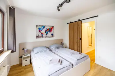 Ein Bett oder Betten in einem Zimmer der Unterkunft Glück Auf Appartements Kammerstr. Duisburg