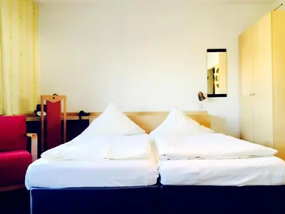 Ein Bett oder Betten in einem Zimmer der Unterkunft Hotel Imperial
