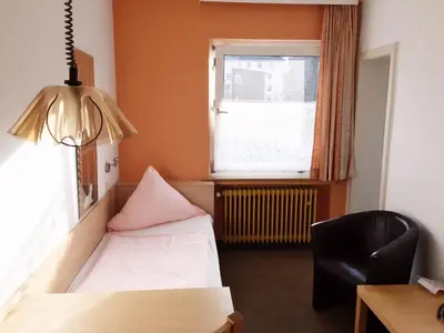 Ein Bett oder Betten in einem Zimmer der Unterkunft Hotel Imperial