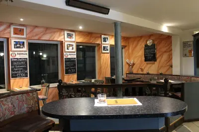 Ein Restaurant oder anderes Speiselokal in der Unterkunft TOTO's Gasthaus