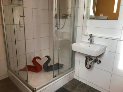 Ein Badezimmer in der Unterkunft Messezimmer 4u