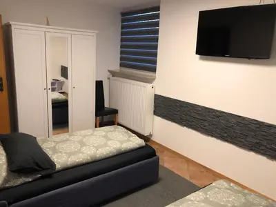 Ein Bett oder Betten in einem Zimmer der Unterkunft Messezimmer 4u