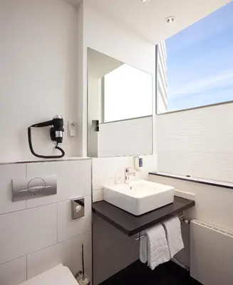 Ein Badezimmer in der Unterkunft Webers - Das Hotel im Ruhrturm