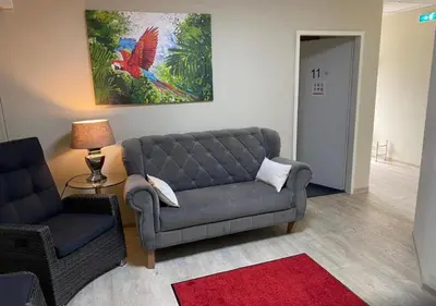 Ein Sitzbereich in der Unterkunft Motel de Winter - Motel - Apartmenthaus - Monteurzimmer