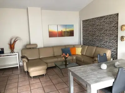 Ein Sitzbereich in der Unterkunft Motel de Winter - Motel - Apartmenthaus - Monteurzimmer