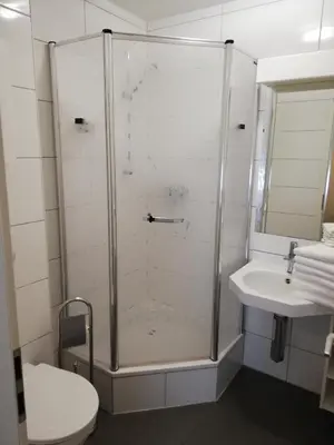 Ein Badezimmer in der Unterkunft Motel de Winter - Motel - Apartmenthaus - Monteurzimmer