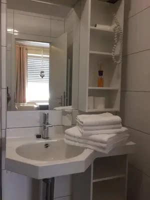 Ein Badezimmer in der Unterkunft Motel de Winter - Motel - Apartmenthaus - Monteurzimmer