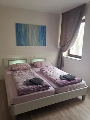 Ein Bett oder Betten in einem Zimmer der Unterkunft Ferienhaus Zoe 120 m2