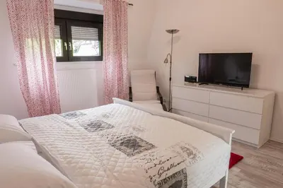 Ein Bett oder Betten in einem Zimmer der Unterkunft Appartment Rheinaue