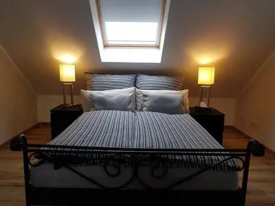 Ein Bett oder Betten in einem Zimmer der Unterkunft Alex
