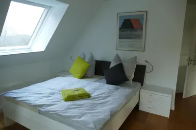 Ein Bett oder Betten in einem Zimmer der Unterkunft Ferienwohnung am Wulfkamp