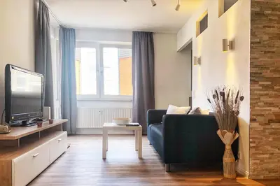 TV/Unterhaltungsangebot in der Unterkunft Gemütliches Apartment mit Balkon und Tiefgaragenstellplatz