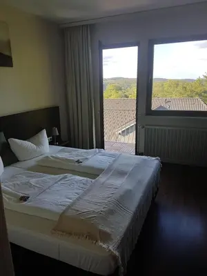 Ein Bett oder Betten in einem Zimmer der Unterkunft Weltmann`s Hotel & Restaurant