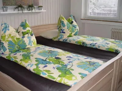 Ein Bett oder Betten in einem Zimmer der Unterkunft Ferienwohnung am Blauen See in Dorsten