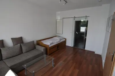 Ein Sitzbereich in der Unterkunft City Apartment Vohwinkel