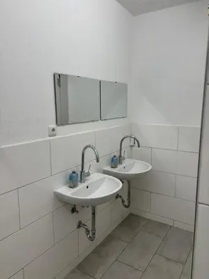 Ein Badezimmer in der Unterkunft Expresszimmervermietung