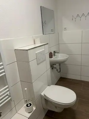 Ein Badezimmer in der Unterkunft Expresszimmervermietung