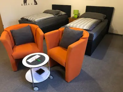 Ein Bett oder Betten in einem Zimmer der Unterkunft Messezimmer 4 u 2
