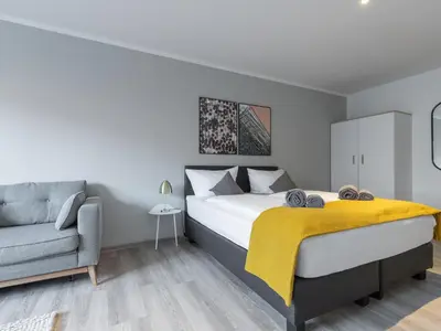 Ein Bett oder Betten in einem Zimmer der Unterkunft Limehome Essen Kibbelstraße