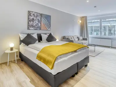 Ein Bett oder Betten in einem Zimmer der Unterkunft Limehome Essen Kibbelstraße