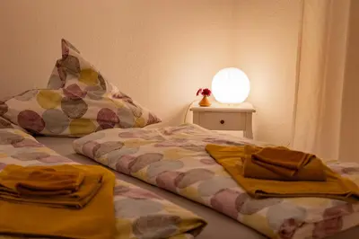 Ein Bett oder Betten in einem Zimmer der Unterkunft Altes Pfarrhaus