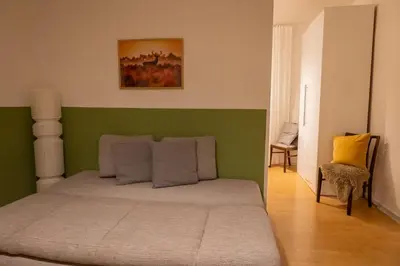 Ein Bett oder Betten in einem Zimmer der Unterkunft Altes Pfarrhaus