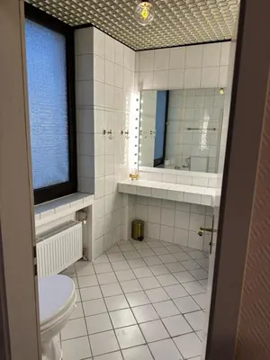 Ein Badezimmer in der Unterkunft Hotel 
