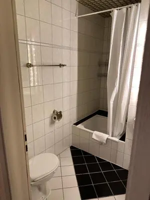 Ein Badezimmer in der Unterkunft Hotel 