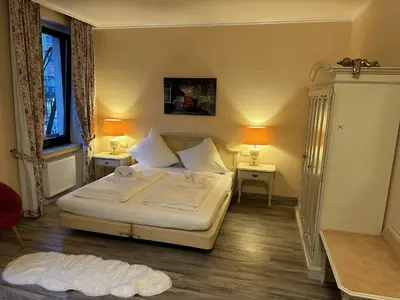 Ein Bett oder Betten in einem Zimmer der Unterkunft Hotel 
