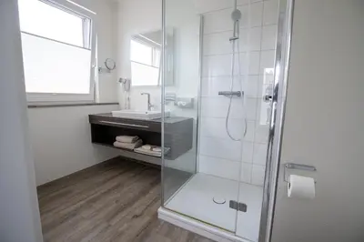 Ein Badezimmer in der Unterkunft Hotel am Tiergarten