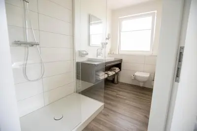 Ein Badezimmer in der Unterkunft Hotel am Tiergarten