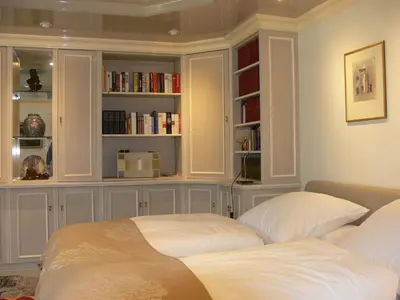 Ein Bett oder Betten in einem Zimmer der Unterkunft Die Villa Mettmann