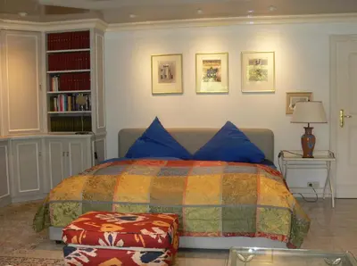 Ein Bett oder Betten in einem Zimmer der Unterkunft Die Villa Mettmann