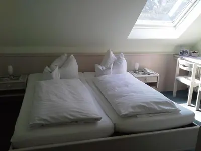 Ein Bett oder Betten in einem Zimmer der Unterkunft Haus Mariandl