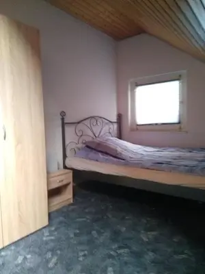 Ein Bett oder Betten in einem Zimmer der Unterkunft Gemütliche Wohnung Nähe Centro