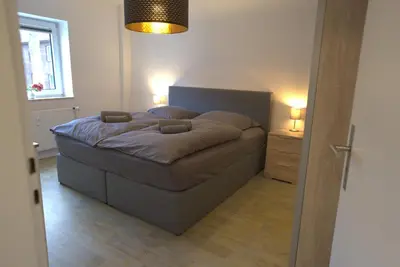 Ein Bett oder Betten in einem Zimmer der Unterkunft Komfort Apartment Oberhausen Sterkrade modern ruhig zentral gelegen