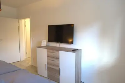TV/Unterhaltungsangebot in der Unterkunft Komfort Apartment Oberhausen Sterkrade modern ruhig zentral gelegen