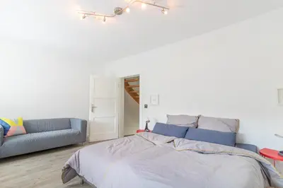 Ein Bett oder Betten in einem Zimmer der Unterkunft Casa Teutoburgia