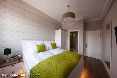 Ein Bett oder Betten in einem Zimmer der Unterkunft Hotel Altes Amtshaus