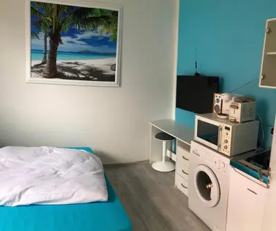 Ein Bett oder Betten in einem Zimmer der Unterkunft Gemütliches Appartement im EG mit eigenem Zugang in guter Wohnlage