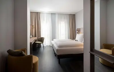 Ein Bett oder Betten in einem Zimmer der Unterkunft elaya hotel oberhausen, Trademark by Wyndham