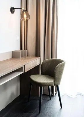 Ein Sitzbereich in der Unterkunft elaya hotel oberhausen, Trademark by Wyndham