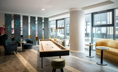 Ein Sitzbereich in der Unterkunft elaya hotel oberhausen, Trademark by Wyndham